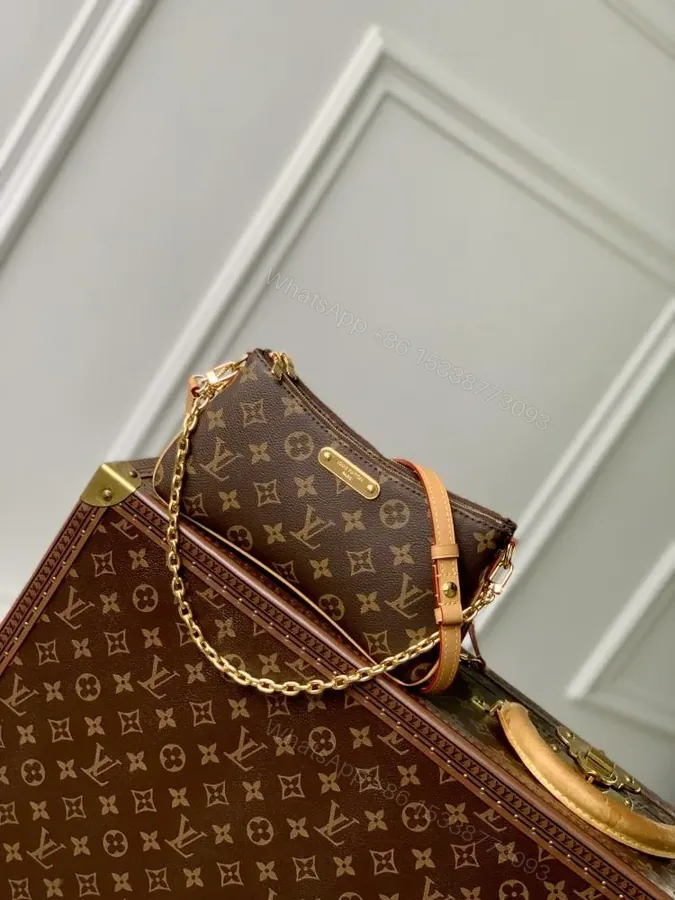 View 1 of LV Pochette Liv Monogram Women
