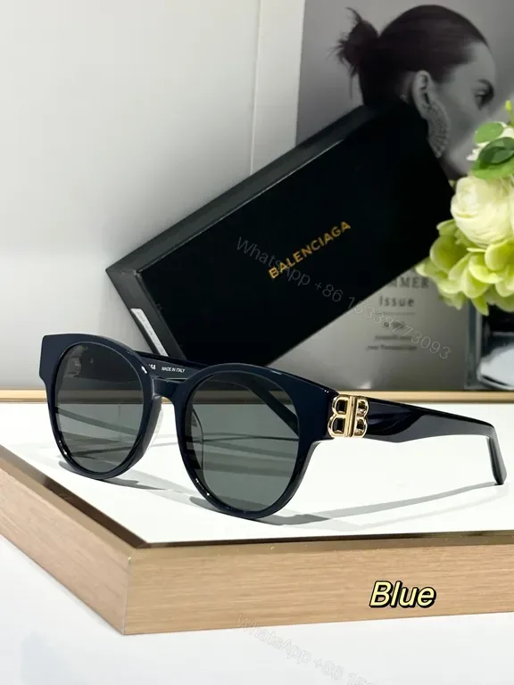 View 1 of Blue Acetate Round Sunglasses with Gold Hardware, Polarized