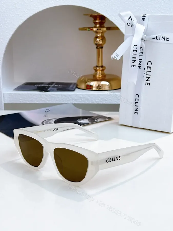 View 1 of White Frame, Brown Lens Luxe Sunglasses - Sleek Cat-Eye Style