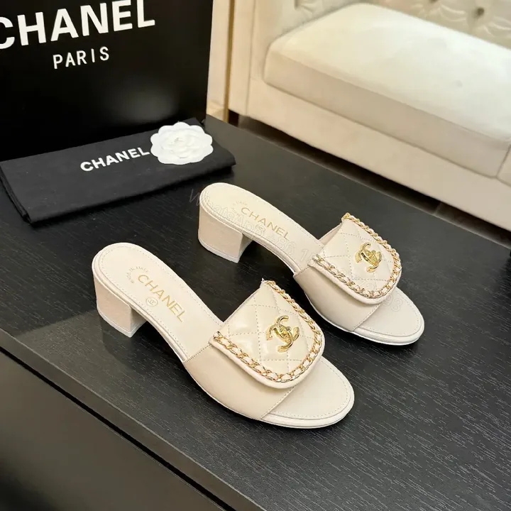 View 1 of Chic Quilted Leather Slides with Gold Logo - Light Beige