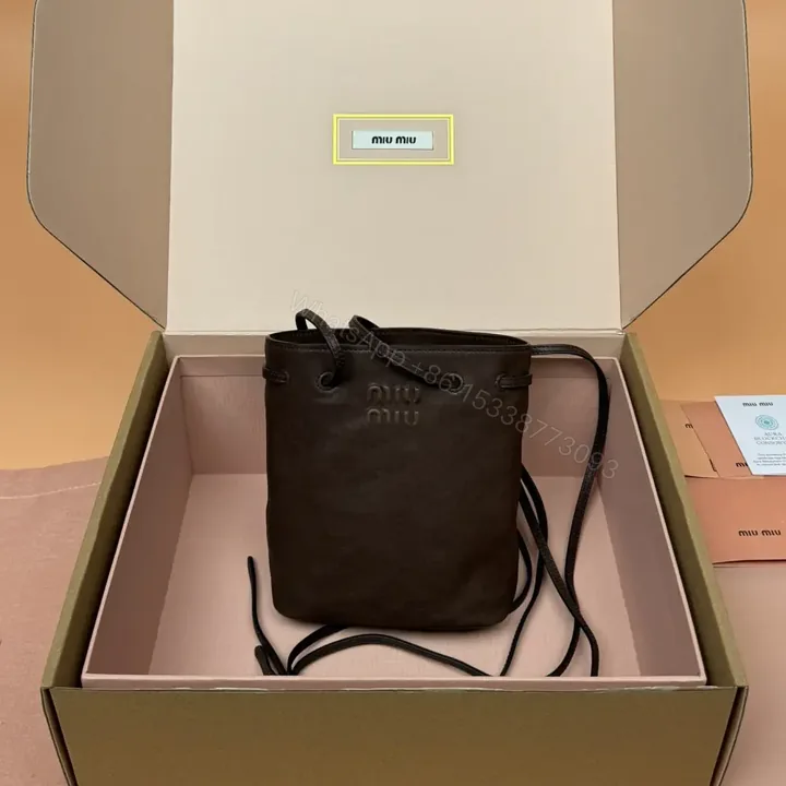 View 1 of 高仿miumiu*5NR460小羊皮水桶包石楠木色免檢版