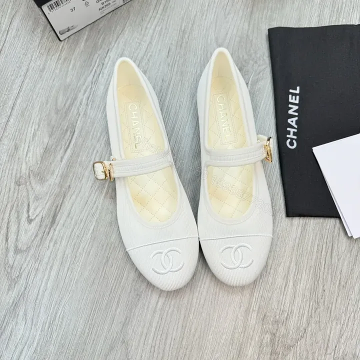 View 1 of White Quilted Leather-Look Ballet Flats with Gold Buckle Comfort