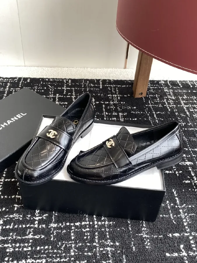 View 1 of Quilted Leather Loafers: Black with Gold Hardware, Premium Style