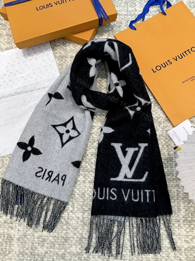 View 1 of Black & gray dual-tone scarf: luxury, woven, fringed