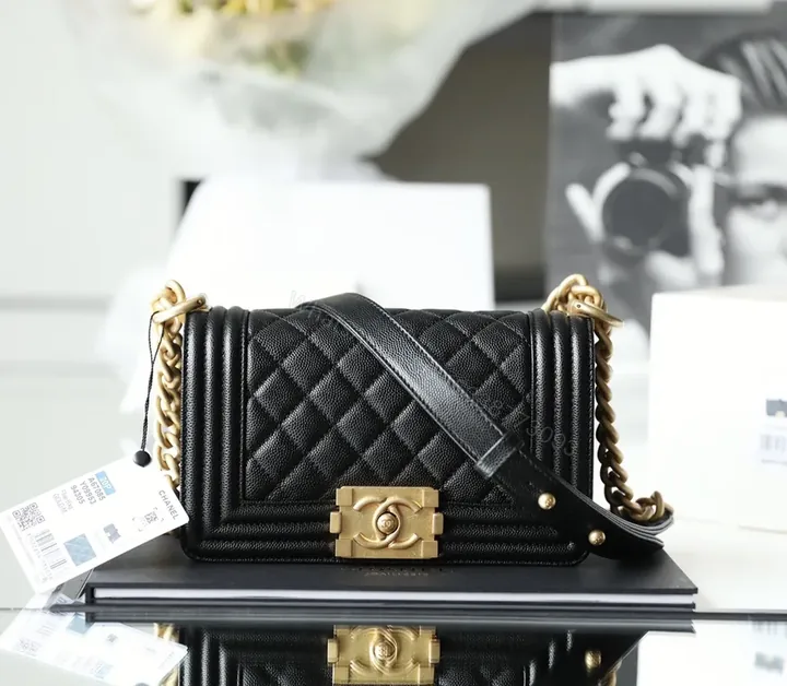 View 1 of Black Calfskin Quilted Luxury Bag with Gold Hardware Clasp
