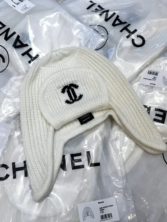 View 1 of Ivory Merino Knit Ear Warmer Hat - Luxe Logo Emblem
