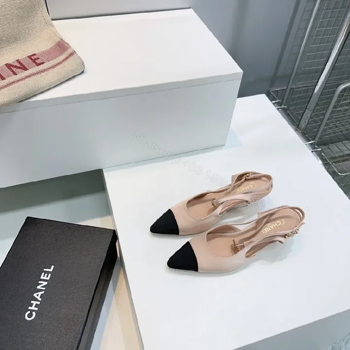 View 1 of Nude Leather Slingback Pumps with Black Cap Toe