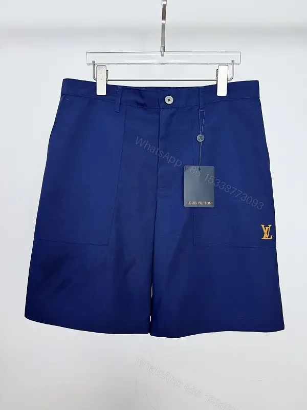 View 1 of Navy Linen Belted Bermuda Shorts Louis Vuitton Logo