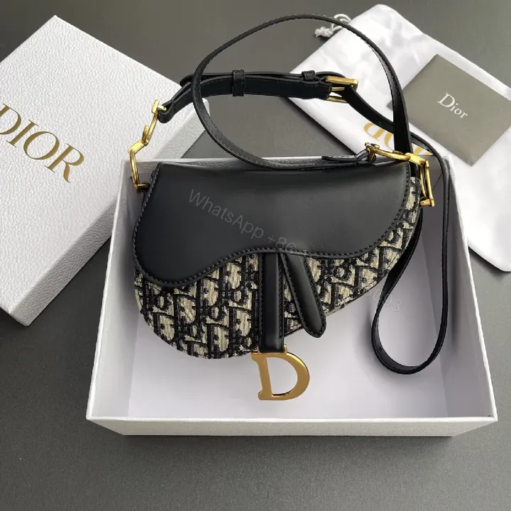 View 1 of Monogram Saddle Bag: Black Leather Trim, Crossbody Style