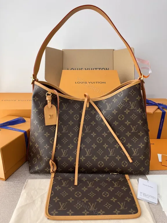 View 1 of Iconic Monogram Tote: LV Canvas, Leather Trim, Everyday Luxury