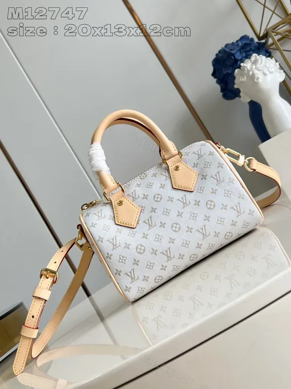 View 1 of Chic Monogram Satchel in Canvas â€“ Structured Luxury Bag