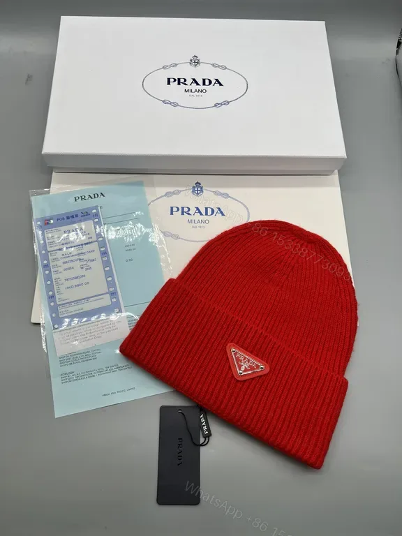 View 1 of Bold Red Prada Knit Beanie: Warm, Luxury Craft, Unisex Style