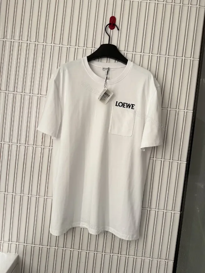 View 1 of Minimalist White Tee with Structured Pocket & Logo Emblem