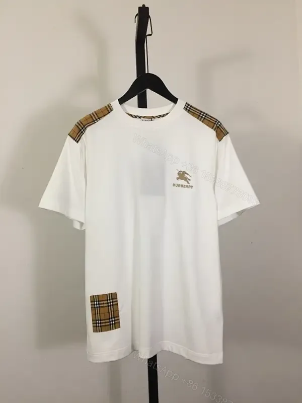 View 1 of Casual Luxe Tee: White Cotton with Plaid Shoulder Accents