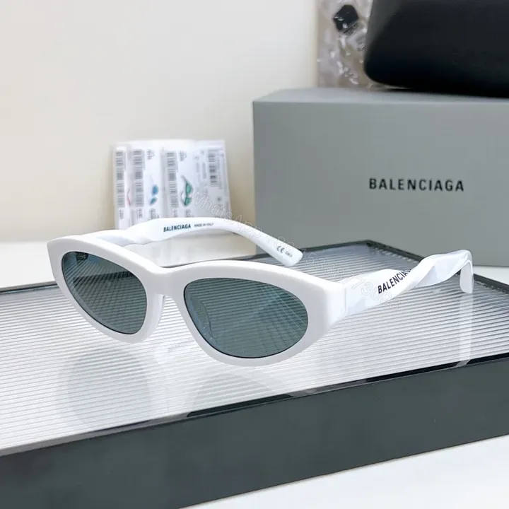 View 1 of Bold Minimalism White Cat-Eye Sunglasses