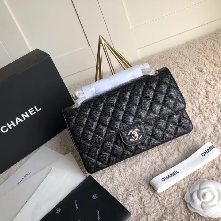 View 1 of Quilted Black Flap Bag with Silver Turn-Lock – Luxury Style