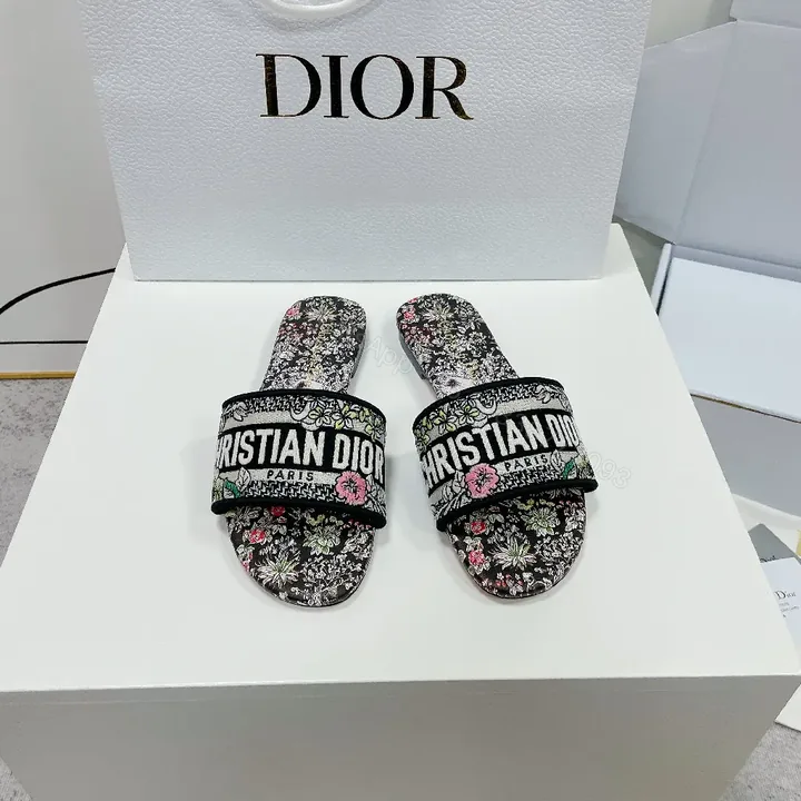 View 1 of Floral-Print Slides in Black with Signature Dior Strap