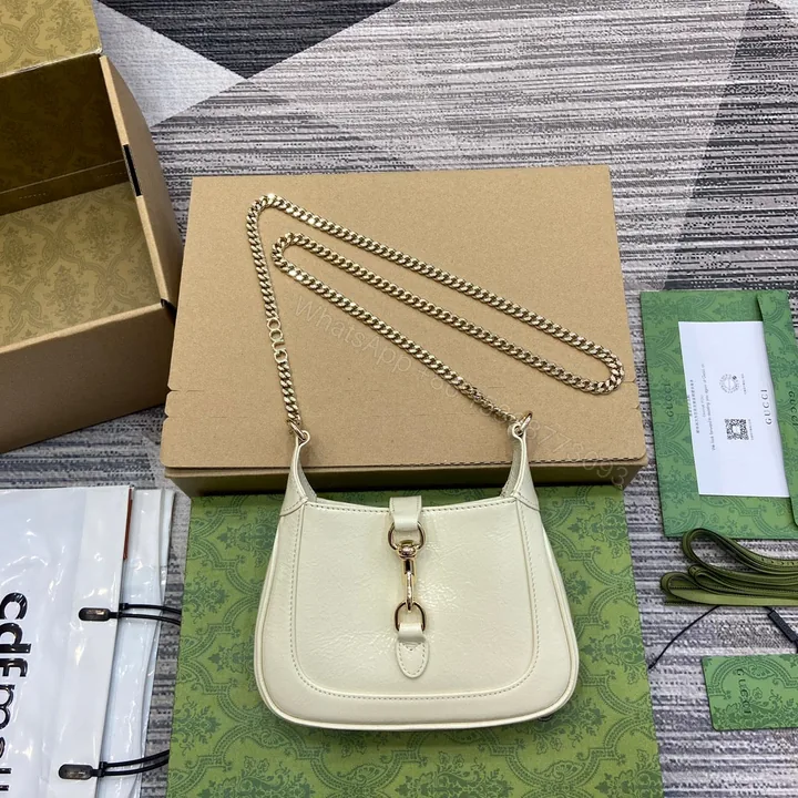 View 1 of JACKIE NOTTE MINI BAG 19 IN WHITE CRACKED LACQUER CALFSKIN GOLD HARDWARE