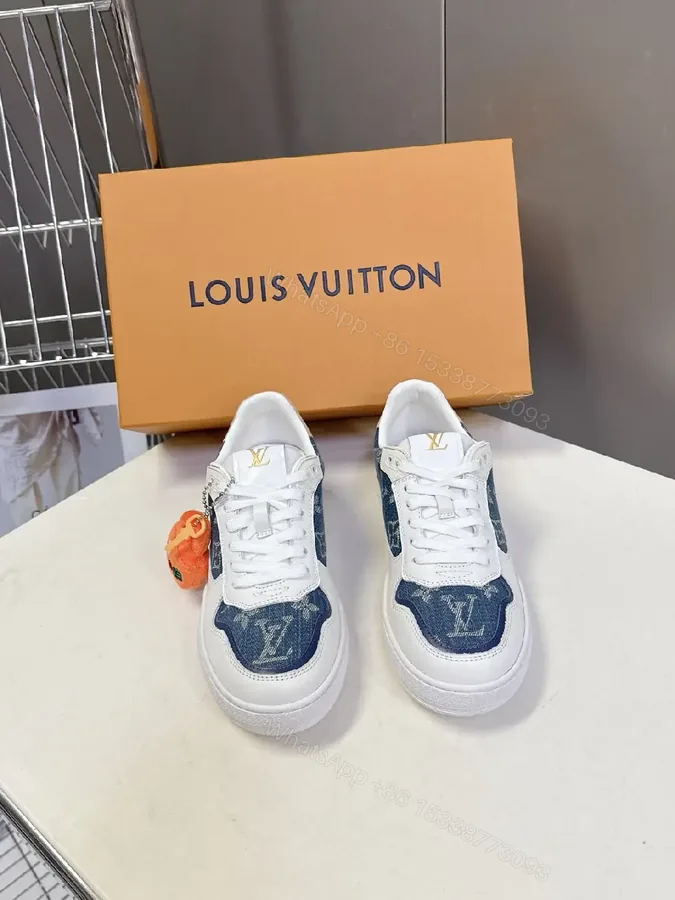 View 1 of Denim-Accent Luxury Sneakers with LV Flair
