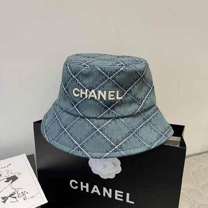 View 1 of Quilted Denim Bucket Hat: Luxe Stitching Chic Accessory
