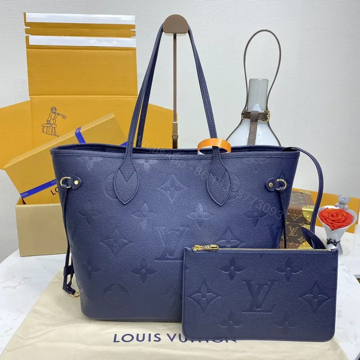 View 1 of LV Neverfull MM Monogram Empreinte Leather