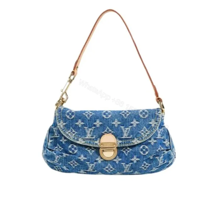 View 1 of Louis Vuitton Pleaty Handbag Monogram Denim Blue 26Cm M95050