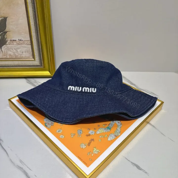 View 1 of Denim Bucket Hat — Structured, Subtle Luxury Embroidery