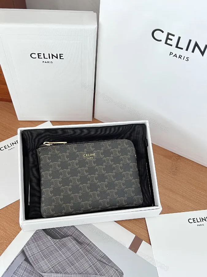 View 1 of Monogram Elegance Wallet: Subtle Pattern, Compact Luxury