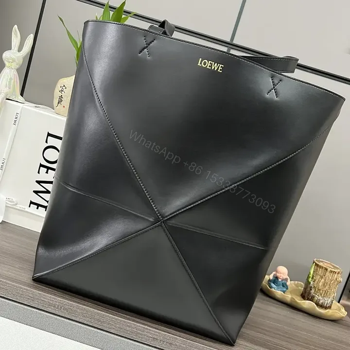 View 1 of Black Leather Structured Tote with Geometric Panels & Gold LOEWE Logo
