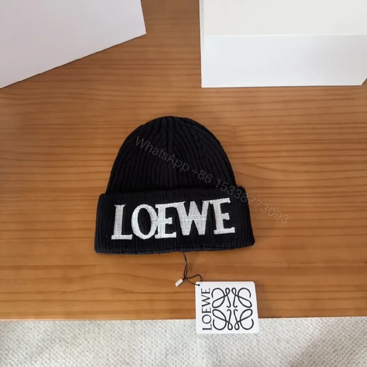 View 1 of Bold Logo Knit Beanie: Luxe Everyday Warmth, Black