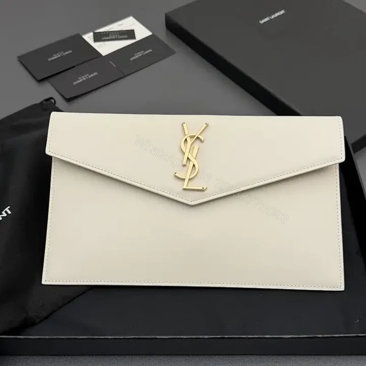 View 1 of Ivory Leather Envelope Clutch with Gold-Tone Hardware, Minimalist Chic