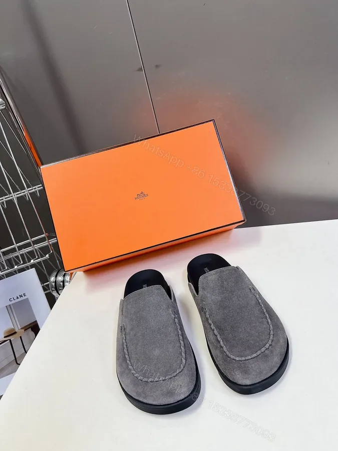 View 1 of Hermes Women Gray Suede Slip-On Loafers