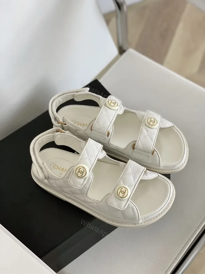 View 1 of White Quilted Sandals with Gold Emblem – Luxe Comfort Sandals
