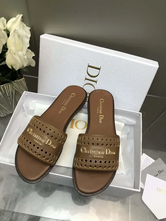 View 1 of Leather-Embellished Slides: Everyday Luxury for Warm-Weather Style