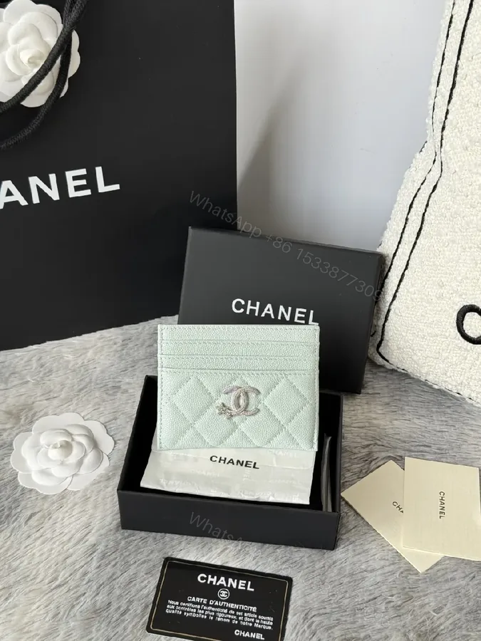 View 1 of Pastel Mint Quilted Leather Wallet with Interlocking CC – Everyday Luxury