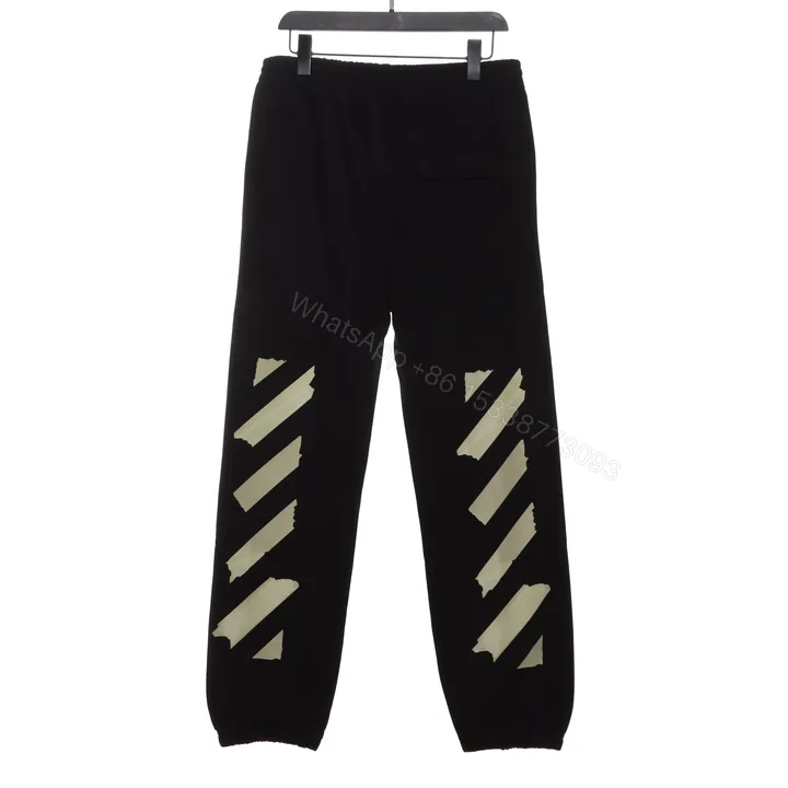 View 1 of Off-White Yellow Rubber Strip Pants
