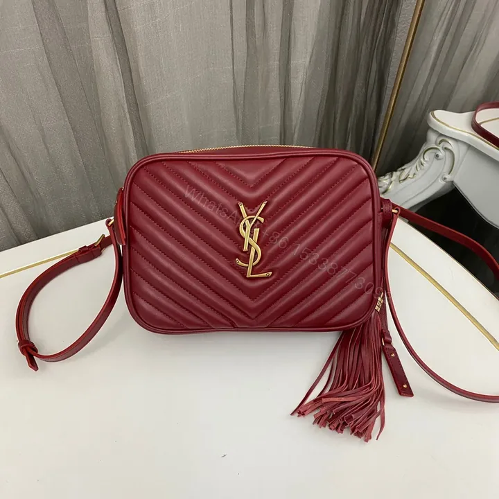 View 1 of Saint Laurent Lou Medium YSL Camera Bag with Pocket and Tassel in Quilted Leather