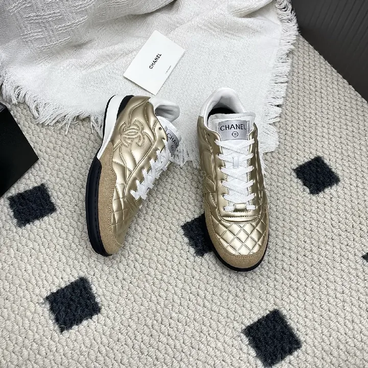 View 1 of Gold Quilted Metallic Sneaker | Luxe Texture, Everyday Comfort