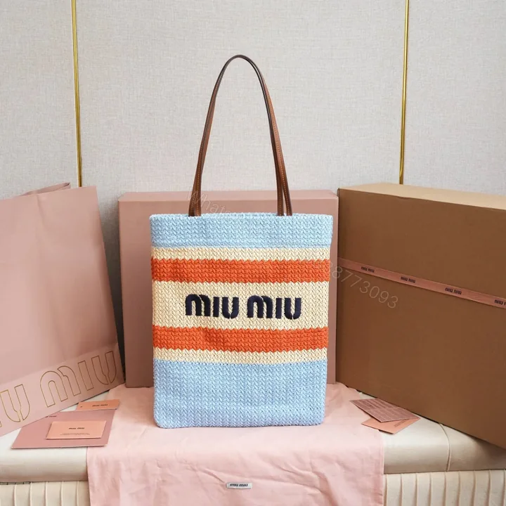 View 1 of 高仿miumiu*5BG248拼色LOGO稻草柳條包藍色免檢版