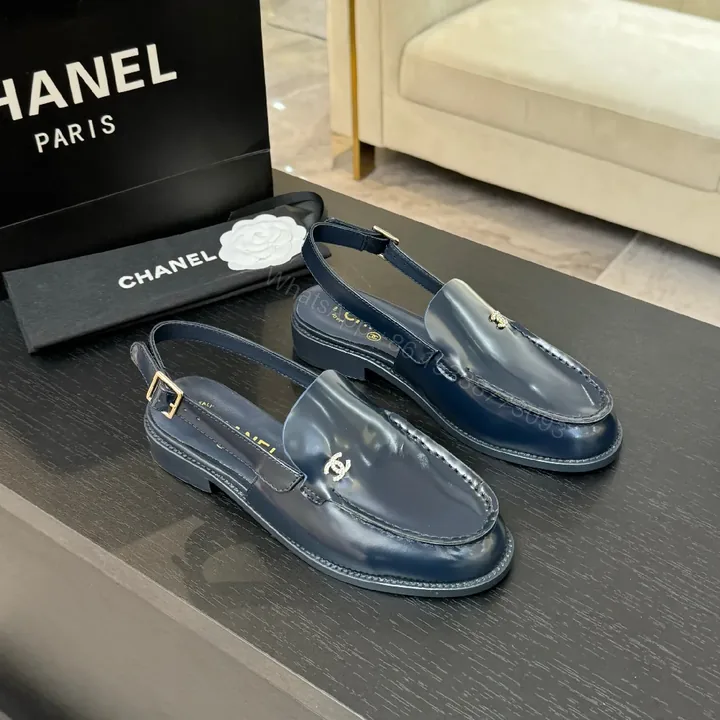View 1 of Navy Patent Slingback Loafers: Luxe Monogram Detail