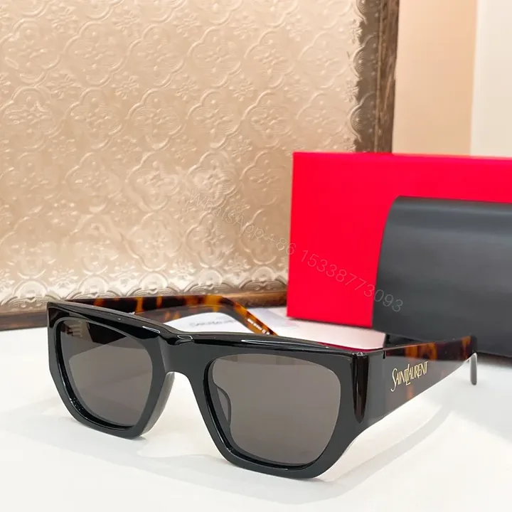 View 1 of Bold Sunglasses: Black Acetate, Tortoise Accents, Polarized Lenses