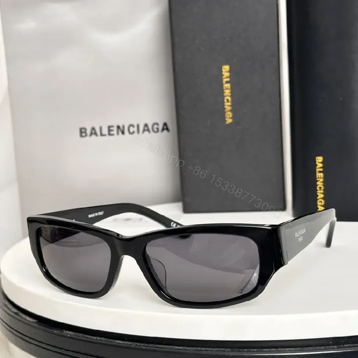 View 1 of Minimalist Black Acetate Sunglasses with Bold Presence