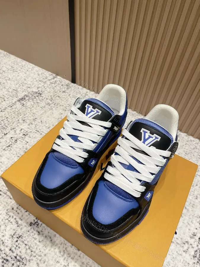View 1 of Textured Blue-Black Leather High-Tops with Bold Detailing