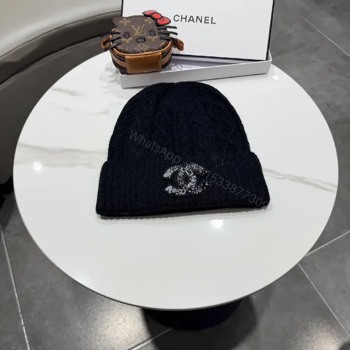 View 1 of Black Knit Beanie with Subtle Crest – Lux, All-Season Comfort