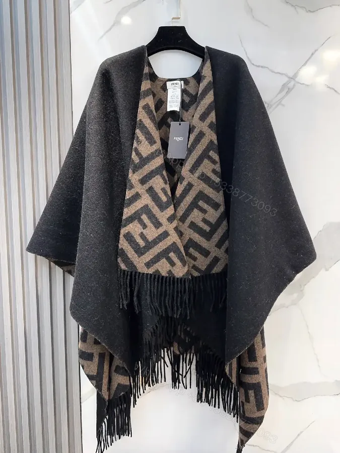 View 1 of Chic Monogram Wool Poncho with Fringe Details