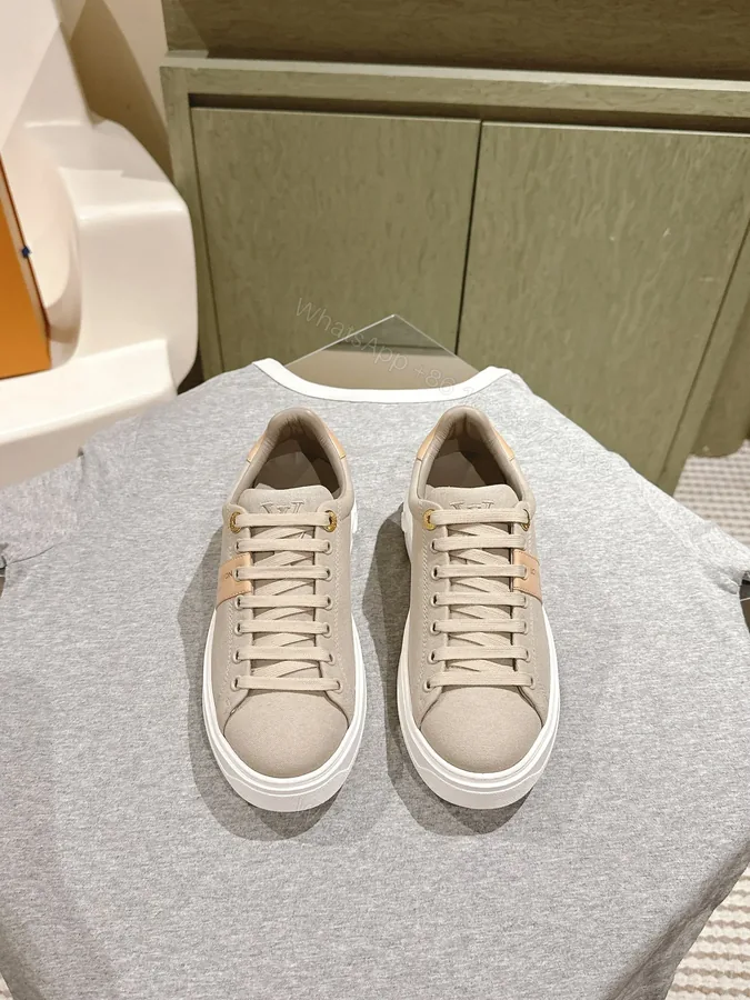 View 1 of LV Women Beige Canvas Sneakers