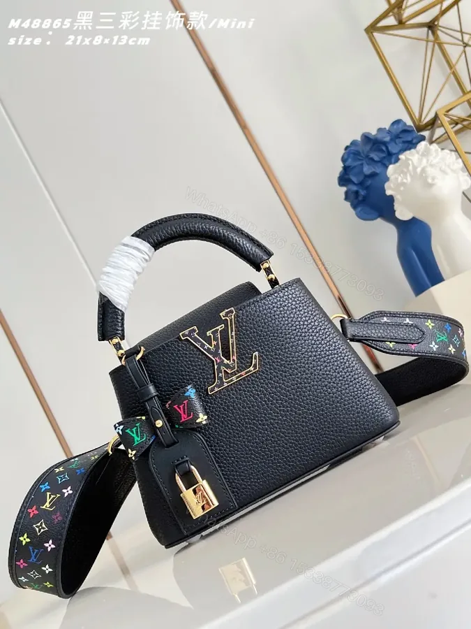 View 1 of Mini Black Satchel: Pebbled Leather, Gold Hardware, Bold Accent