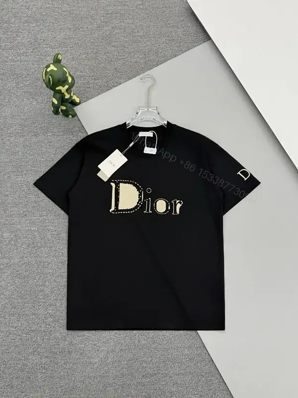 View 1 of Bold Black Cotton Tee: Subtle Luxe Dior Graphic
