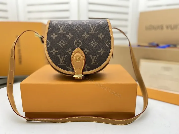 View 1 of Monogram Saddle Bag: Compact Crossbody, All-Day Style