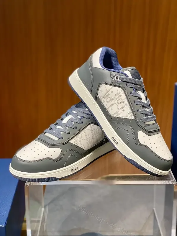 View 1 of Low-Profile Luxury Trainer with Monogram Panels, Grey-Cue Sneakers